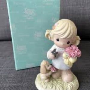 Precious Moments February Figurine